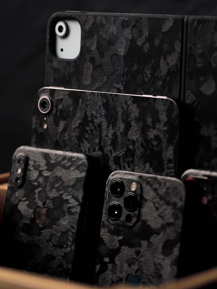 Forged Carbon directional light reflection across smartphone back